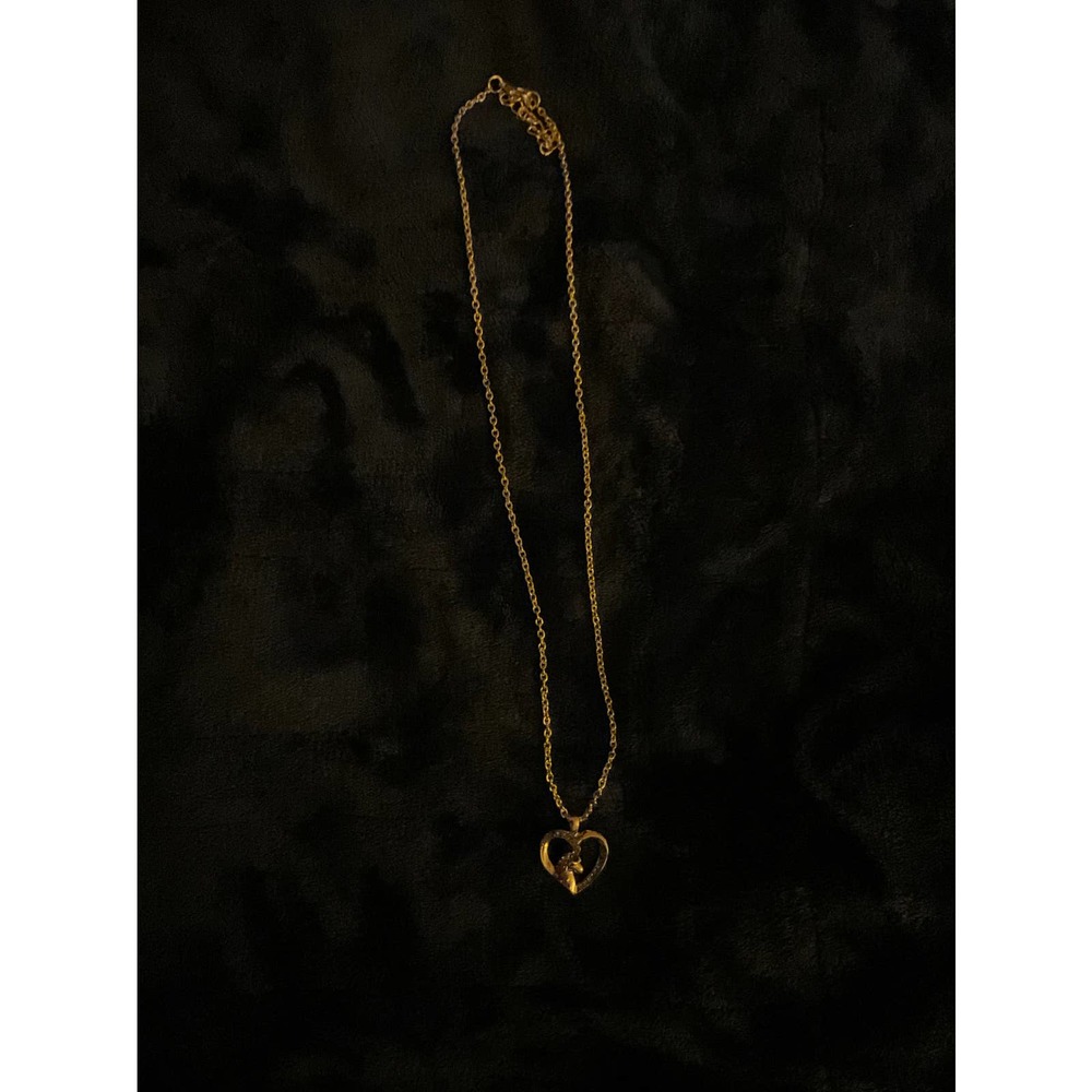 Unicorn in a heart pendant necklace.  0201